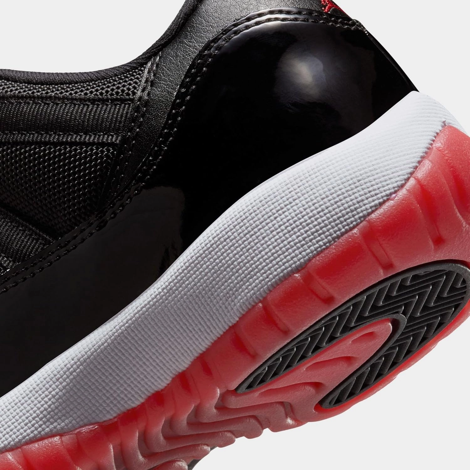 Air Jordan 11 Retro Low Bred Grade School Lifestyle Shoes (Black/Red/White)