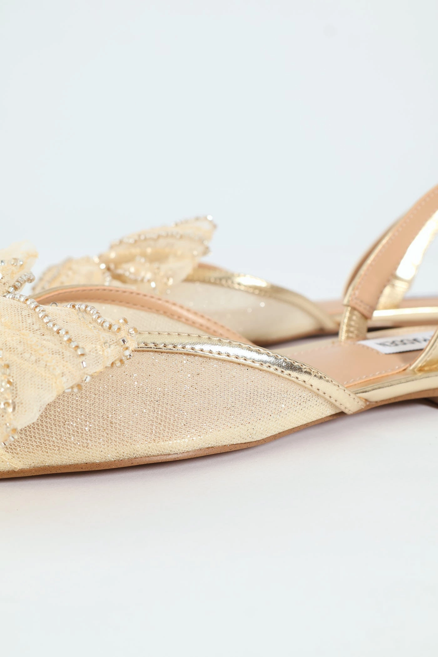 Calibria Pointed Toe Bow Sling Back - Gold
