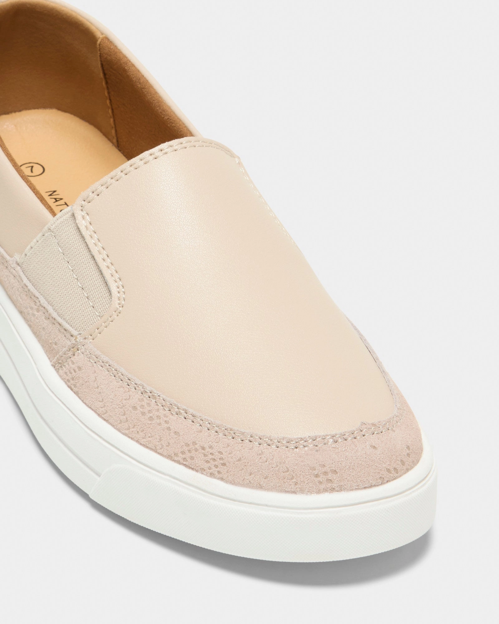 Nora Beige